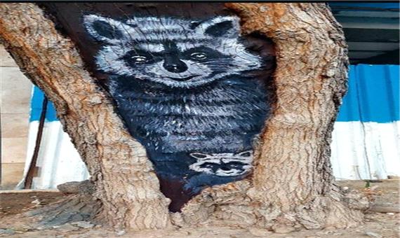 آثار بدیع هنری بر روی درختان خشکیده منطقه2 نقش بست